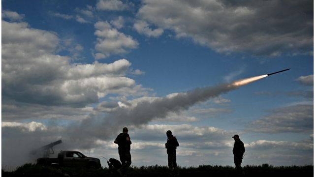 Ukrainian soldiers launch a missile.