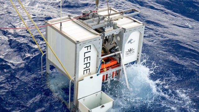 The Limiting Factor LF, an ultra deep-diving submersible, just above the ocean