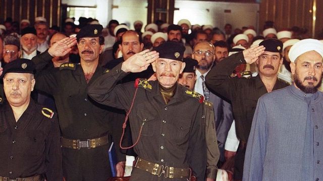 Mararka qaarkood, Al Dowri wuxuu ka qeybgeli shirarka muhiimka ah isaga oo matalayo Saddaam Xuseen