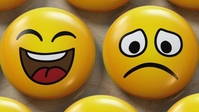 Emojis riendo y triste