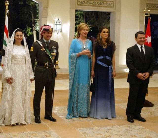 Jordan's King Abdullah II, his wife Queen Rania, Queen Noor, mother of the groom, Crown Prince Hamzah, the groom, his bride Princess Noor, Sherif Asem bin-Nayef and his ex-wife Firouzeh Vokhshouri, parents of the bride, attend the royal wedding on May 27, 2004 in Amman, Jordan