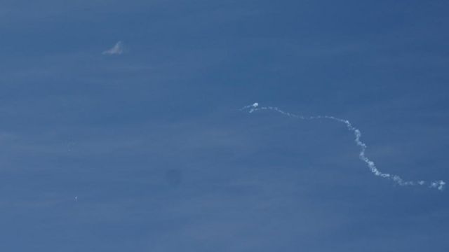 A view of what is believed to be a suspected Chinese spy balloon when it was shot down, seen from Holden Beach, U.S., February 4, 2023.