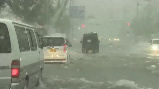 Roads flooded by Typhoon Goni