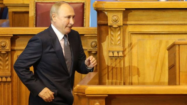 путін