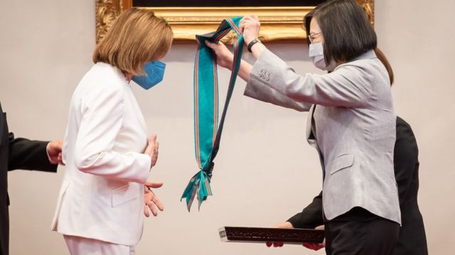 Nancy Pelosi (left) received the Order of Propitious Clouds with Special Grand Cordon, Taiwan's highest civilian honour, from Tsai Ing-wen in Taipei
