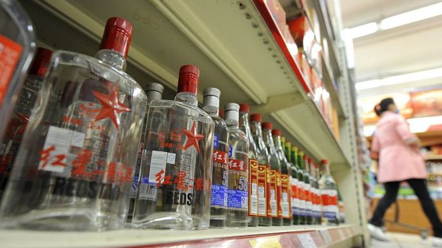 Bottles of baijiu are displayed at a store in Beijing