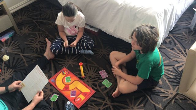 Keri Mcmenamin's children Quinn and Nyala play board games
