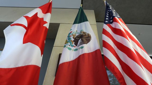 The Mexican, US and the Canadian flags sit in the lobby where the third round of the NAFTA renegotiations are taking place in Ottawa, Ontario, September 24, 2017.
