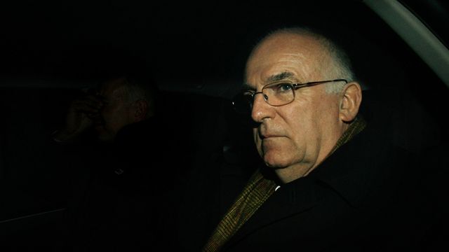 Sir Richard Dearlove in 2008, sitting in the back of a car
