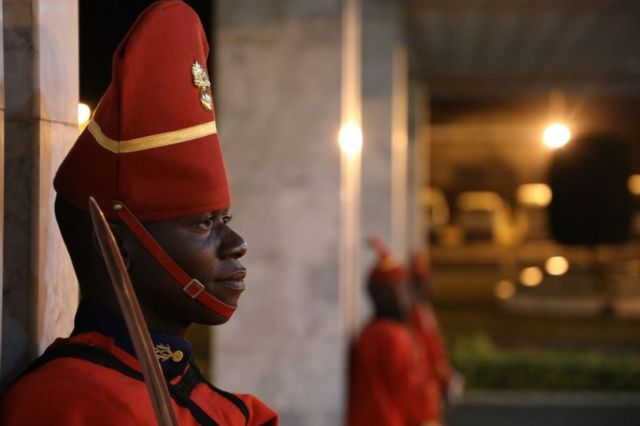 Senegalese guard of honor waits at the airport for the arrival ceremony of French President Emmanuel Macron at the airport on Febuary 2, 2018, in Dakar.