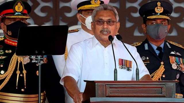 Sri Lanka's President Gotabaya Rajapaksa (C) addresses the nation along with Army Commander Shavendra Silva (L), Navy Chief Nishantha Ulugetenne (2L) and Airforce Chief Sudarshana Pathirana (R) during the Sri Lanka's 73rd Independence Day celebrations in Colombo on February 4, 2021
