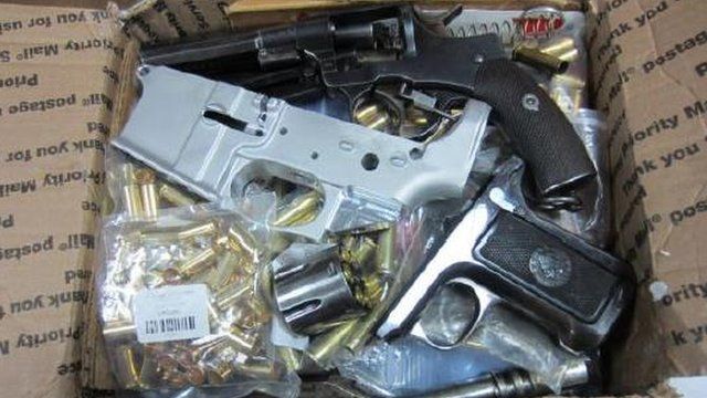 The guns and ammunition were seized during a search of a house