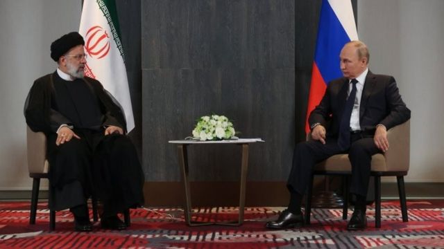 Iranian President Lacey and Russian President Vladimir Putin