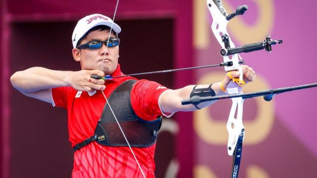 Takaharu Furukawa of Japan competes in Men's individual 1/8 eliminations match during the Archery events of the Tokyo 2020 Olympic Games at the Yumenoshima Park in Tokyo, Japan, 31 July 2021.