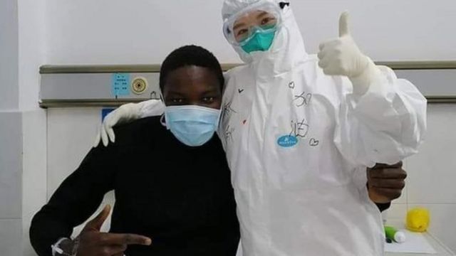 Kem Senou Pavel Daryl and health worker pose for foto