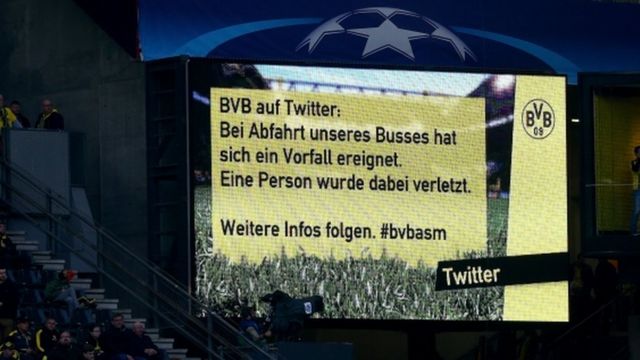 A message at Dortmund's Signal Iduna Park tells fans about the bus explosion