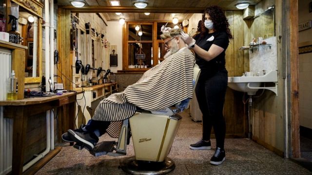 Hairdresser Robert Verhulst and his staff prepare and practice for a possible reopening of his business in Gouda