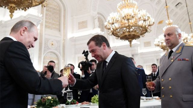 Top leader Dmitry Medvedev celebrating with Russian President Putin