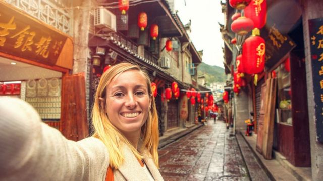Woman taking a selfie in China