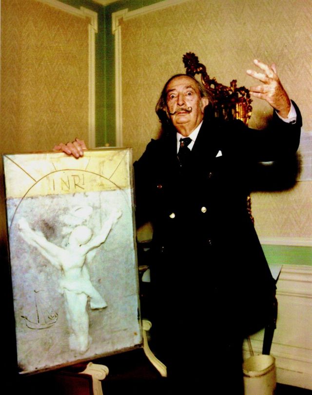 Salvador Dalí with his wax sculpture, Christ of Saint John of the Cross