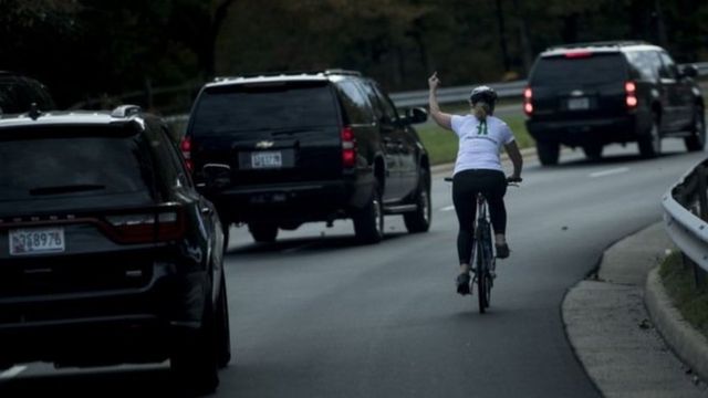Woman fired for showing Trump motorcade the middle finger