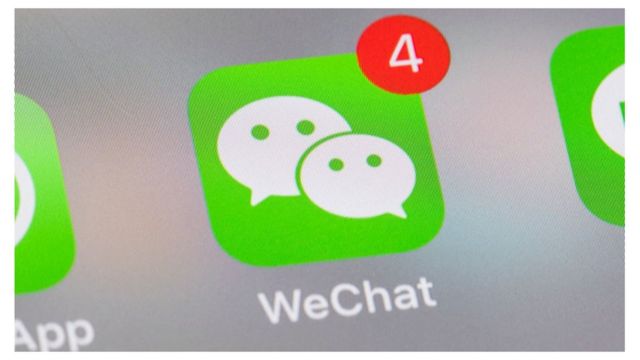 smart phone with the icons for the social networking apps WeChat and others