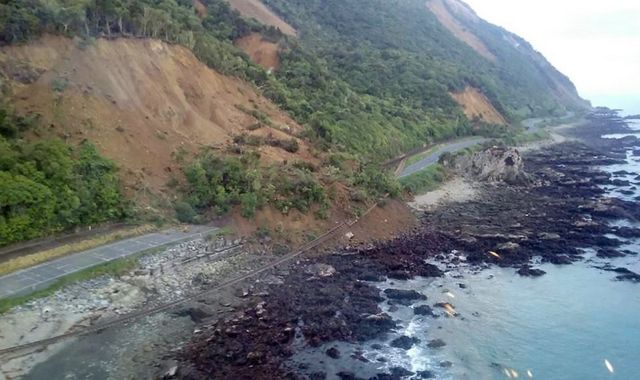 A handout photo taken and received on 14 November 2016, show earthquake damage to State Highway One near Ohau Point on the South Island"s east coast.