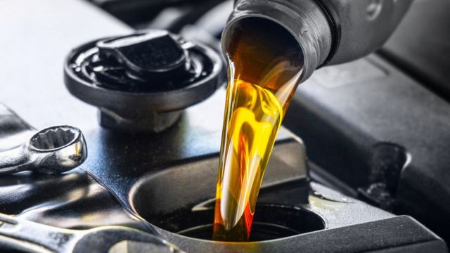 Oil poured into a car tank