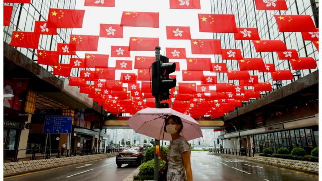 Many Chinese national flags and Hong Kong regional flags are seen in the Hong Kong market.