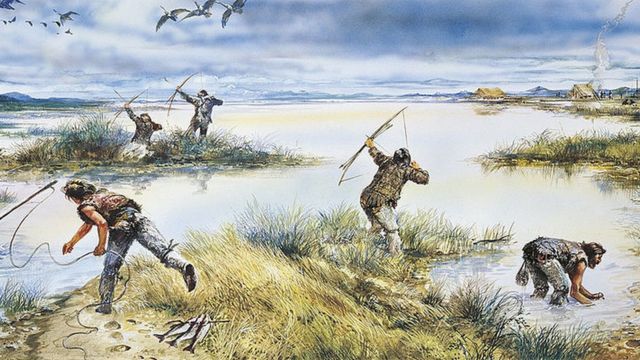 Dibujo de hombres de la prehistoria cazando.