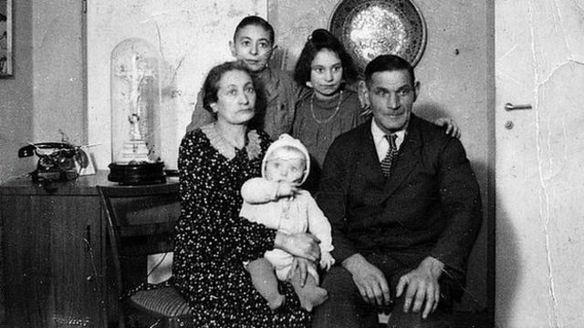 Sonny and his family pose for a picture taken in 1945 - the day before he and his mother were deported