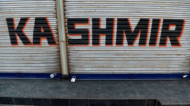A closed shop is pictured during curfew in Srinagar on August 7, 2019.