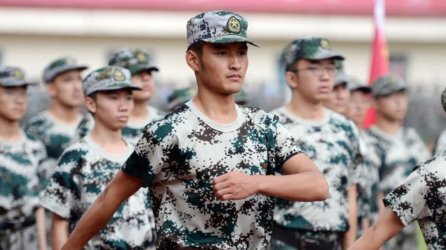 Chinese students participating in military training
