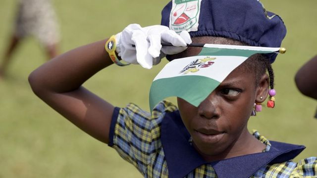 Small school girl with Nigeria flag