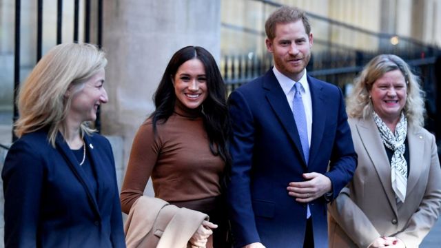 Britain"s Prince Harry and his wife Meghan, Duchess of Sussex stand with High Commissioner for Canada in the United Kingdom Janice Charette and deputy High Commissioner Sarah Fountain Smith as they leave after their visit to Canada House in London