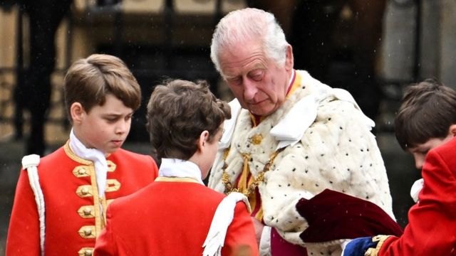 King Charles arrives in the Diamond Jubilee State Coach from Buckingham Palace to Westminster Abbey for his coronation ceremony