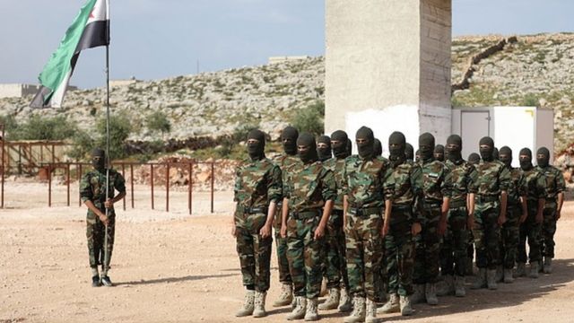 Fighters from the Jaysh al-Izza (the Army of Glory), affiliated with the Turkish-backed Free Syrian Army, take part in a training session in the northwestern Syrian city of Idlib on April 9, 2018.