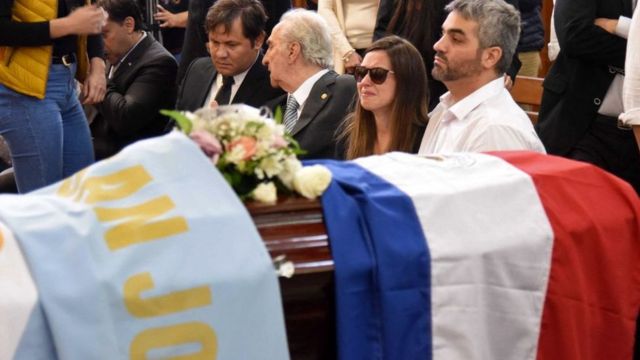 Claudia Aguilera during a mass event before the funeral of her husband Marcelo Becky.