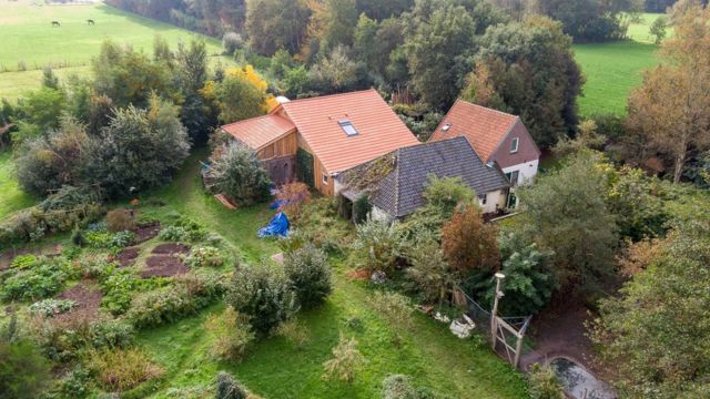 A drone photo of the farm, where a father and six children had been living in the cellar, in Ruinerwold, The Netherlands