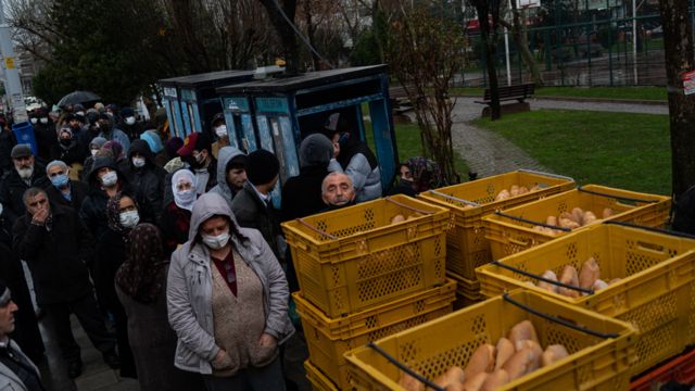 People queue outside state-run bread shop in Turkey