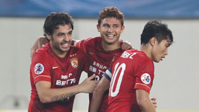 Elkeson De Oliveira Cardoso, Goulart Pereira and Zheng Zhi of Guangzhou Evergrande celebrates his goal with teammates during the AFC Asian Champions League Group H match between Guangzhou Evergrande and Kashima Antlers at Tianhe Sports Center on March 18, 2015 in Guangzhou, China.