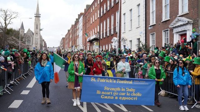 In pictures: St Patrick's Day parades return - BBC News