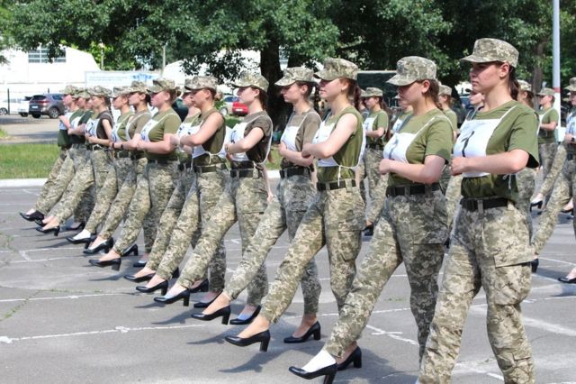 Female soldiers in Ukraine marching in high heels