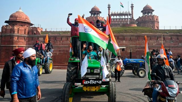 Farmers take part in a tractor rally as they continue to protest against the central government's recent agricultural reforms, in front of Red Fort in New Delhi on January 26, 2021.