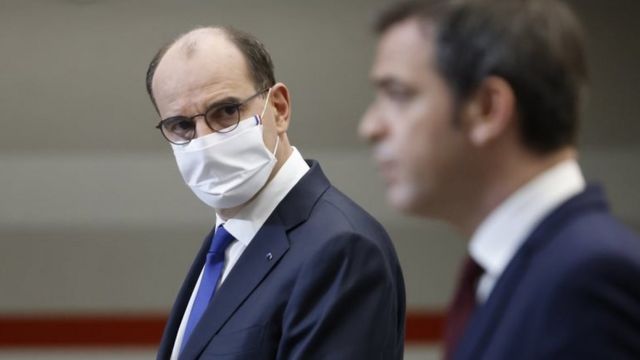 French Prime Minister Jean Castex (L) and French Health Minister Olivier Veran address a press conference in Paris, France