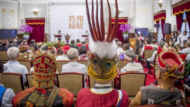 Representatives, dressed in traditional clothing, from some of Taiwan"s 16 recognised indigenous tribes, attend a ceremony inside the Presidential Office building in Taipei on August 1, 2016