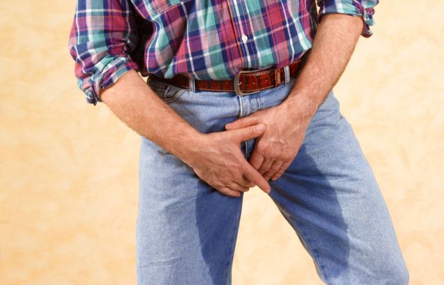 Pantalon avec poche urinaire pour homme souffrant d'incontinence