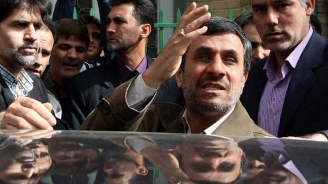 Mahmoud Ahmadinejad waves to supporters outside a polling station in Tehran, in a 2012 picture.
