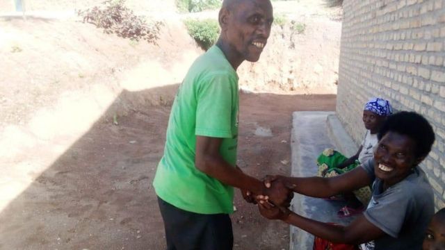 Munyanziza and Mukagahima exchanged glances and chatted next to their house