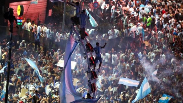 Argentina supporters celebrate after winning the FIFA World Cup Qatar 2022 at the Obelisco in Buenos Aires, Argentina, 18 December 2022. Argentina defeated France 4-2 in a penalty shoot-out after a 3-3 draw to win the World Cup for the third time.
